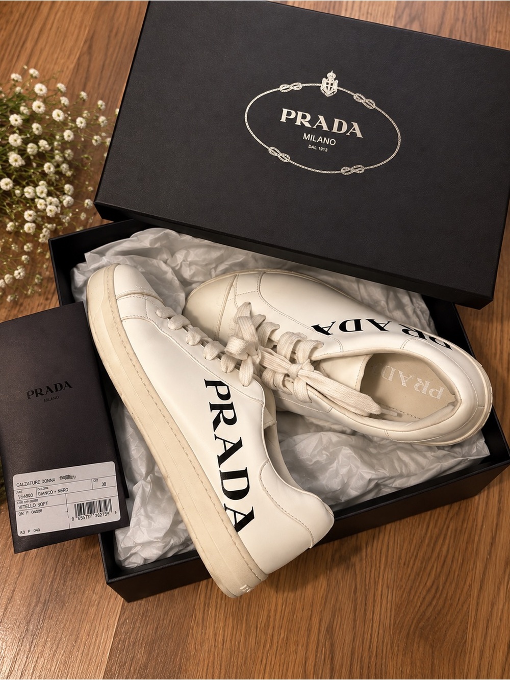 Prada White Leather Low-Top Sneakers with Black Logo